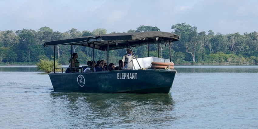 Image of boat safari at Kabini reservoir, tourist exploring the wildlife sanctuary