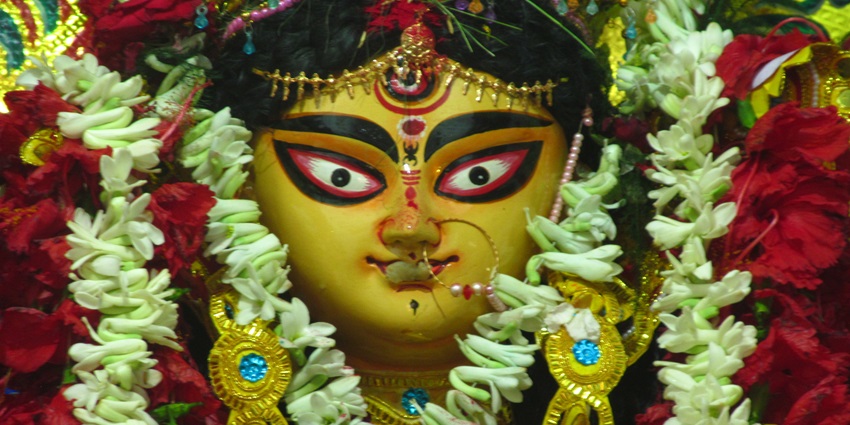 Statue of Maa Annapurna at Annapurna Temple, featuring the goddess with detailed carvings and traditional attire.