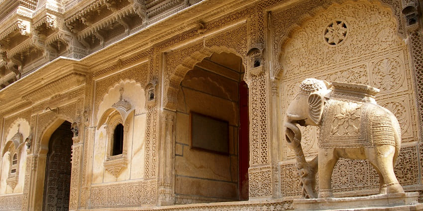 Wide angle shot of a beautiful Haveli and its majestic carving on the walls and pillars