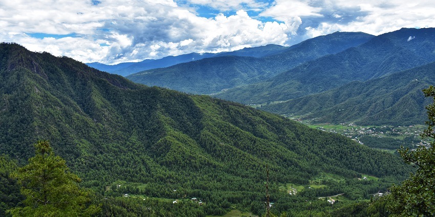 Breathtaking valleys of the Himalayas in Bhutan, with a view of snow-covered peaks and deep gorges