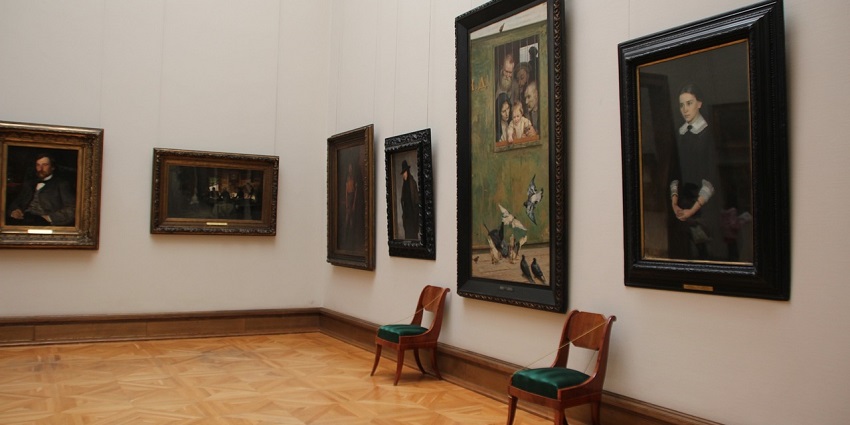 Museum wall adorned with captivating artwork, adding charm and character.