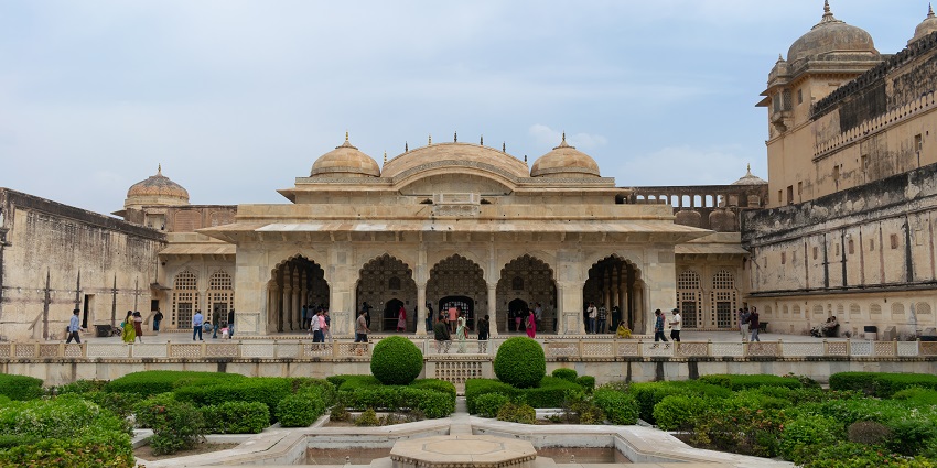 Wear comfortable shoes, carry water, and follow photography rules for attractions.