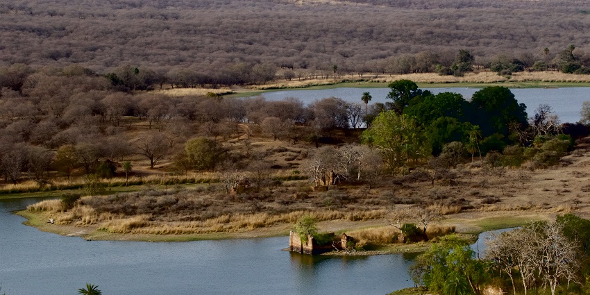 A peaceful view of a lake called Padam Talao, which is the largest lake in the region.