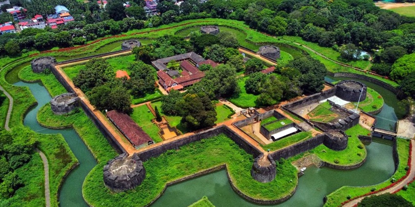 A view of the Palakkad Fort surrounded by serene waters, one of the top forts in Kerala.