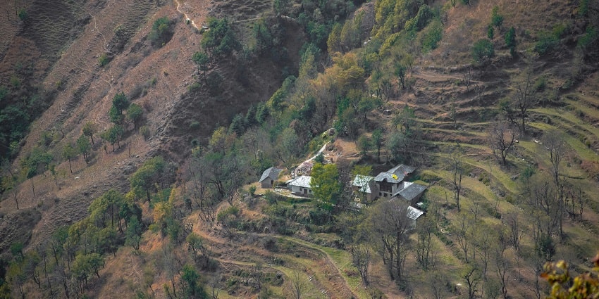 A breathtaking vista of rocky terrains and terraced fields of Palampur, Himachal Pradesh.