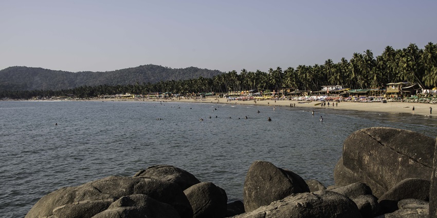 Known for its crescent-shaped beachfront, serene blue waves, and colourful beach shacks bordering the sands.