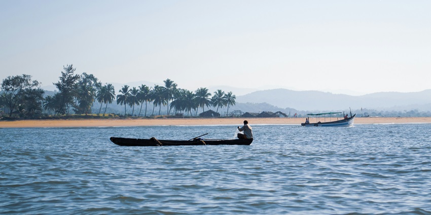 Enjoy the scenic views at Palolem Beach which is a famous tourist attraction in Goa.