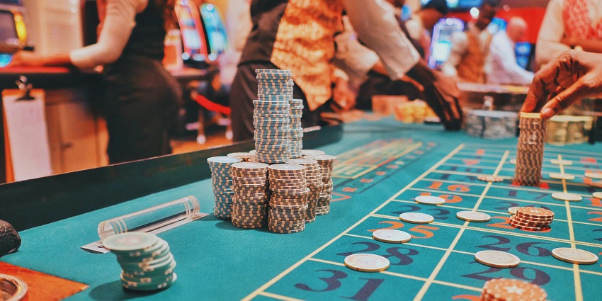 A glimpse of coins and a table at the Panji Casinos, a leisure hub in the region.