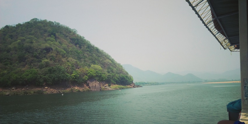 An evening view over the hills of Papikondalu casting a indicolite glow on the forested landscape