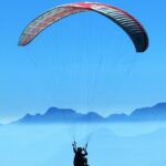 The aerial view of Shimla, from a paraglider, showcasing the Himalayan mountains.