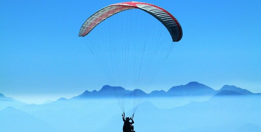 The aerial view of Shimla, from a paraglider, showcasing the Himalayan mountains.