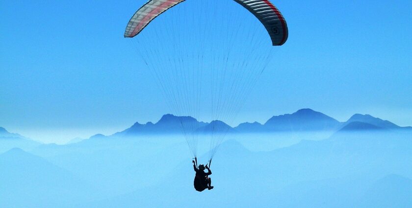 An image of paragliding in Kullu one of the most exciting sports to do this trip.