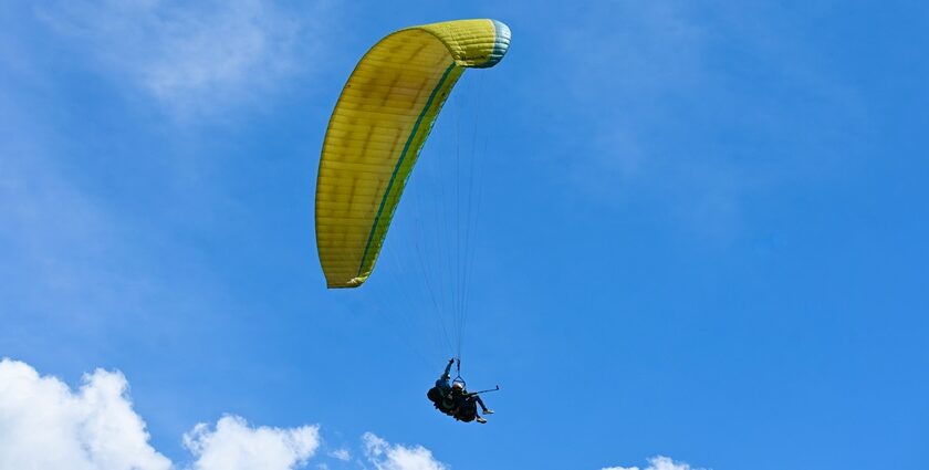 Paragliding near Udaipur offers breathtaking views of lakes, palaces, and hills.