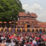 Elephants in front of a huge crowd at Paramekkavu Temple during the Pooram festival.