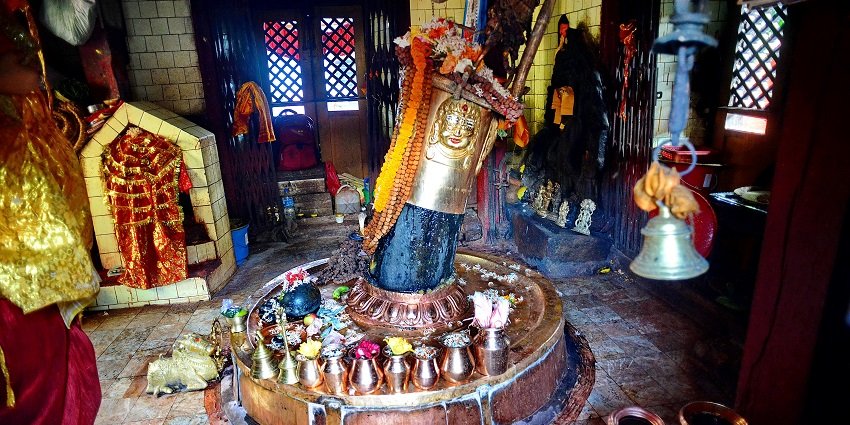 A Hindu temple dedicated to Parasnath, with a Shiva linga, radiating auspicious vibes.