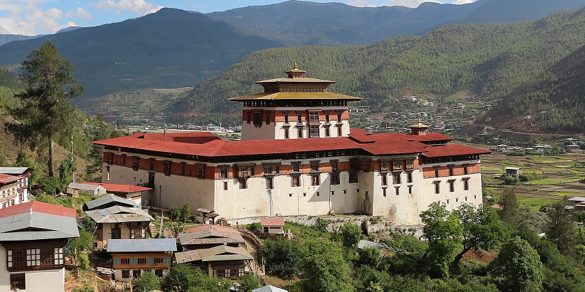 Rinpung Dzong fortress-monastery towering over the Paro Valley landscape.