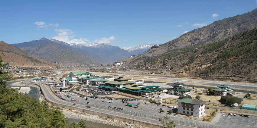 High-angle shot of Paro Airport, the major airport in Bhutan, showcasing Bhutanese design.