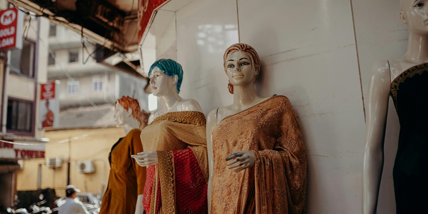 An image of Patiala Bazaar displaying colourful traditional Punjabi attire and accessories.