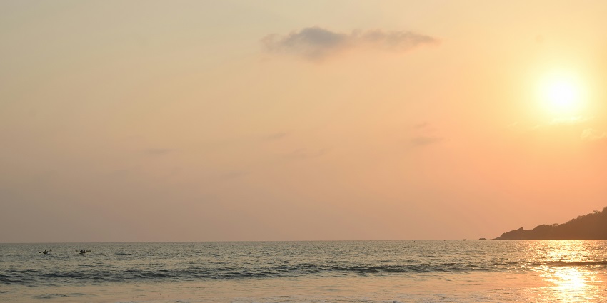 A panoramic vista of Patnem Beach, one of the serene hidden beaches in South Goa.