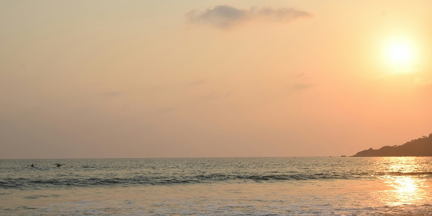 The sun setting down at the famous Patnem Beach, one of the top beaches in South Goa.