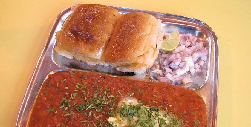 Mouth-watering pao bhaji, served with onions and lemon, one of the best foods in Jamnagar