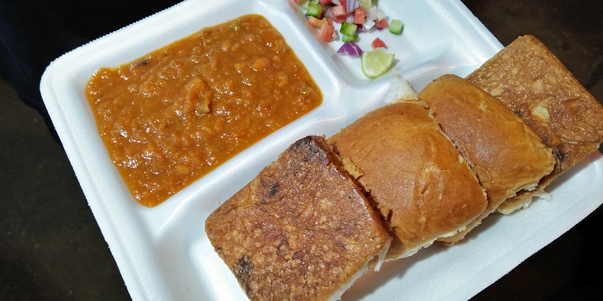 Tasty Pav Bhaji with a slice of buttered pav and sprinkling, one of the best street foods in Jamnagar