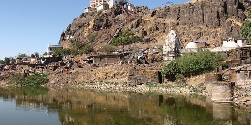Image of a sacred lake and hindu temple on the top of Pavagadh hill, Gujarat