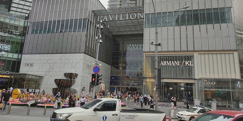 Pavilion Kuala Lumpur with a striking glass facade, - a place for shopping in Malaysia.