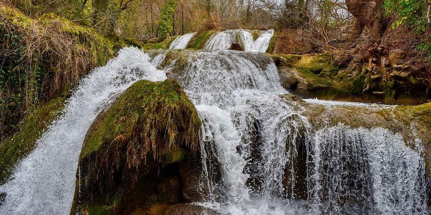 A scenic view of Pawa waterfall in the forest, a famous place near Karera Wildlife Sanctuary
