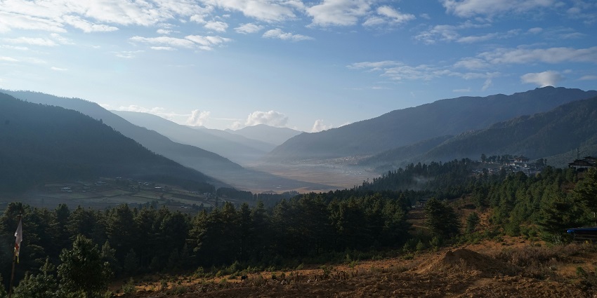 Phobjikha Valley, Bhutan, with green grass surrounded by beautiful mountains