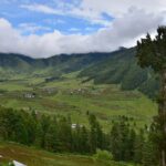 A panoramic view of Phobjikha Valley in Bhutan which offers lush green meadows.