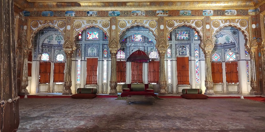 Beautiful architecture of Phool Mahal Palace, showcasing intricate carvings and history.