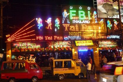 A brightly lit, jungle-themed restaurant in Phuket with people enjoying their meals