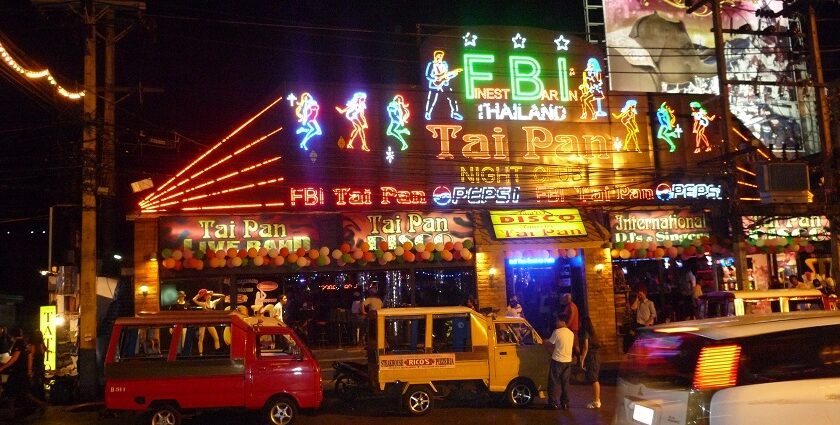 A brightly lit, jungle-themed restaurant in Phuket with people enjoying their meals