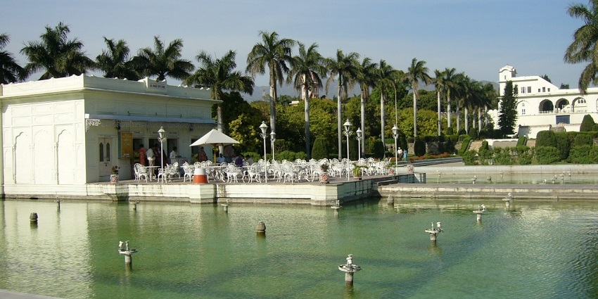 Picturesque view of the Pinjore gardens, encircled by tall palm trees