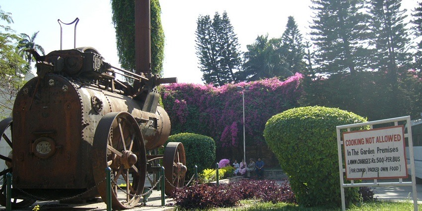 The garden features an old machine and instructions board. Located in near the panchkula zoo