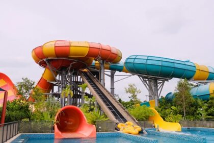 Feel the rush on the exhilarating water slide at Pink Pearl, a premier spot for water park.