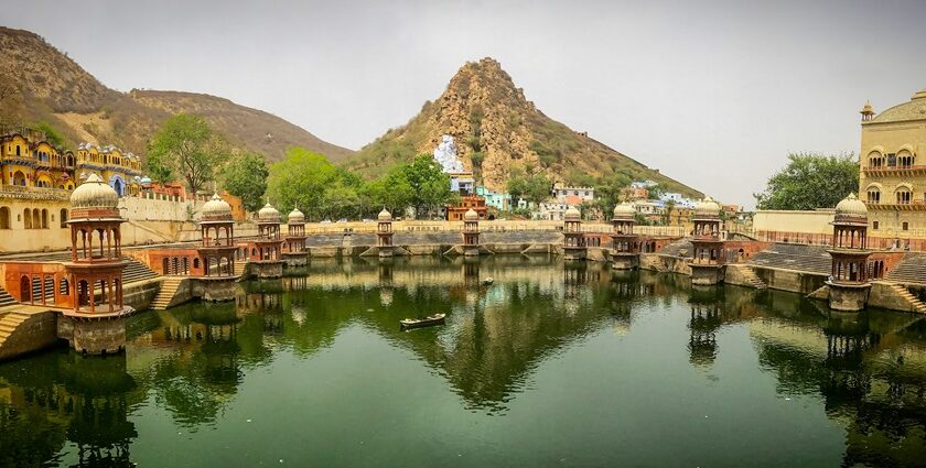 View of the Palace surrounded by water, a popular tourist attraction in Alwar