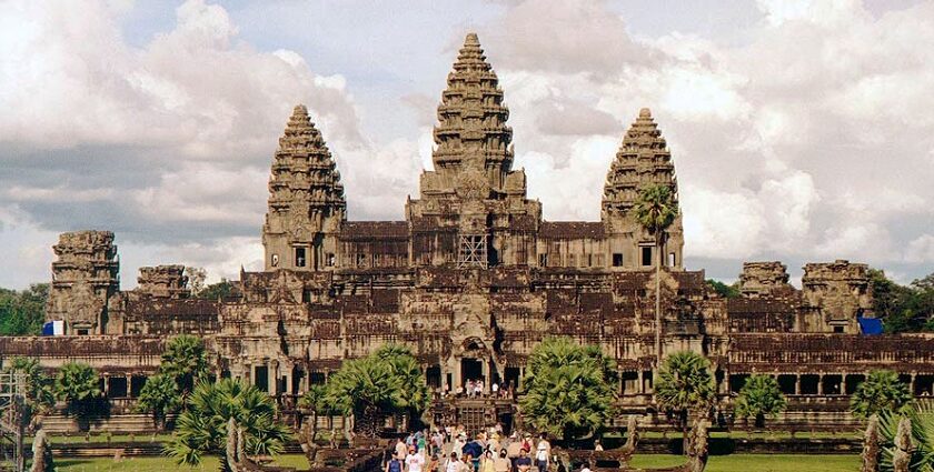 Angkor Wat reflected in a tranquil pool of water, one of the best places to visit in Cambodia