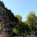 A picture of a monument in Hisar with trees and greenery all around the place