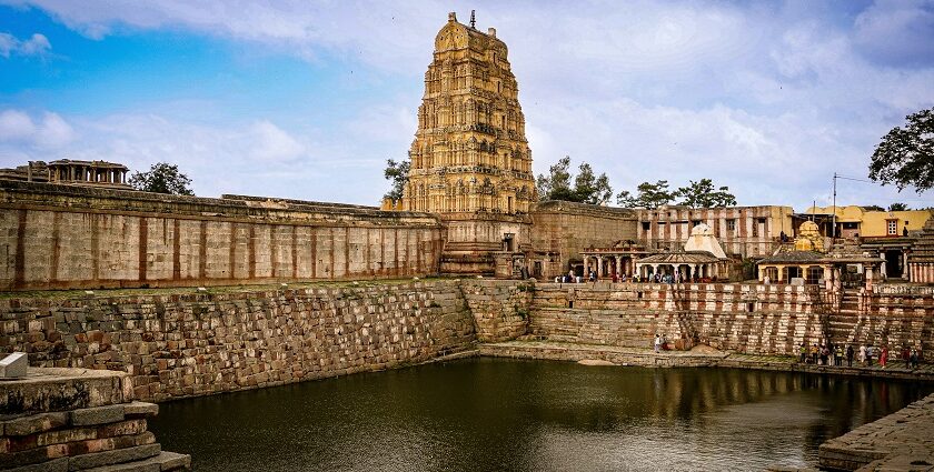 A glimpse of a famous temple in the region of Madhya Pradesh surrounded by azure waters.