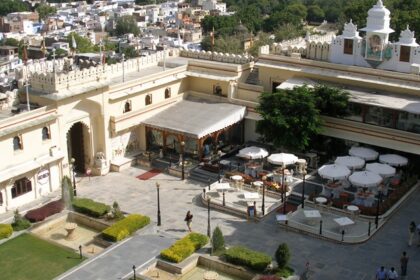 Udaipur Palace, with ornate architecture, is one of the best places to visit in Udaipur at night.