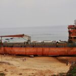 A rustic cargo ship halted at one of the ports in Visakhapatnam with a perfect backdrop.