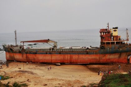 A rustic cargo ship halted at one of the ports in Visakhapatnam with a perfect backdrop.