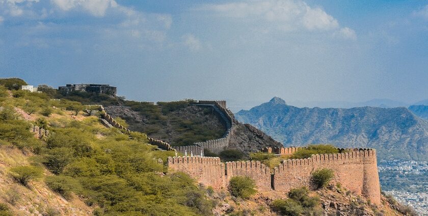 A beautiful view of fort in Ajmer, with a blue sky and silhouetted buildings