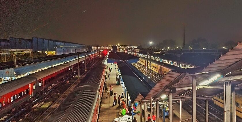 A night shot captured of Ambala Cantt station with a crowd on platform.