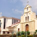 A picture of a church near Margao surrounded by beautiful gardens