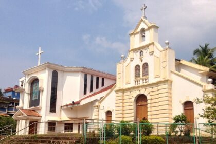 A picture of a church near Margao surrounded by beautiful gardens