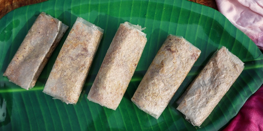 Delicate Andhra sweet pootharekulu, made with rice paper and filled with sweets.