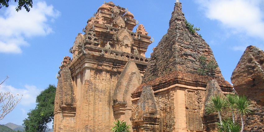 The iconic Po Nagar Cham Towers in Vietnam with intricate designs exuding rustic charm.
